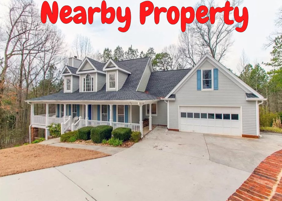 0.66 Acre Unrestricted Wooded Lot Just Steps Away from Lake Sinclair with Direct Access!! Just